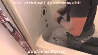 How to remove tub fiberglass shower enclosure demo tearout Small bathroom remodel [upl. by Umeko]