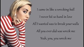 Miley Cyrus  WRECKING BALL Lyrics [upl. by Aynahs349]