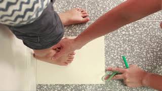 How to measure your childs foot for shoe size [upl. by Enomad145]