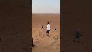 Thrilling Sandboarding Adventure in the Dubai Desert Sandboarding DubaiDesert TravelDubai [upl. by Eidas]