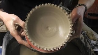 Throwing  Making a torn ragged rimmed pottery bowl on the wheel [upl. by Ridinger724]