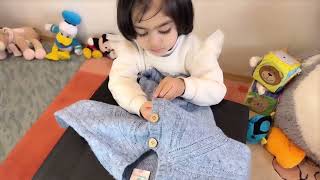 Preschool Life Skills Unbuttoning and Buttoning a Shirt  Montessori Practical Life Lesson [upl. by Nertie]