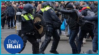 Protests in Europe Police in Amsterdam clash with antilockdown protesters [upl. by Osmo]