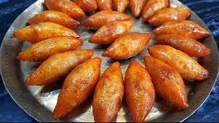 Mug Puli Pitha  সেরা স্বাদের মুগ পুলি পিঠা রেসিপি  Bengali Pithe Puli Recipe  Moong Shamli Pitha [upl. by Adnohsel955]