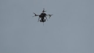 Red Bull Quadcopter at Ashbourne Shrovetide Football Tues 4th Mar 2014 [upl. by Yrhcaz]