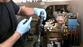 Honda Rancher 2009 IRS CV boot  axle install 4 [upl. by Tennek]