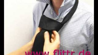 Tying a cravat Half Windsor front [upl. by Werdnaed37]