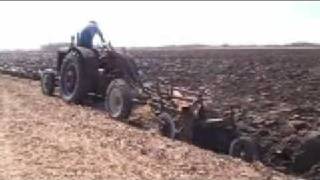 McCormick Deering WD40 Diesel Tractor Plowing [upl. by Etnoek]