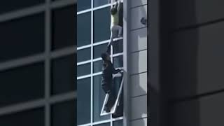 Heroic Act Man Saves Child from Window short [upl. by Ahsoyek]