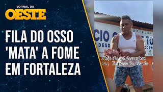 Distribuição de ossos mata a fome de necessitados em Fortaleza Humilhação [upl. by Stockmon]