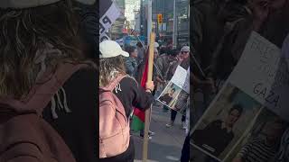 People accepting New Testaments at AntiIsrael Pro Palestine Demonsstration in Toronto [upl. by Anelyak788]