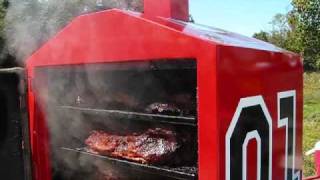 BBQ Smoker loaded with 18 full sized beef briskets Cooking with Wine and the BBQ Vault [upl. by Sellig]