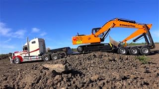 RC ADVENTURES  Semi pulling Earth Digger 4200XL Excavator [upl. by Ahtinak945]