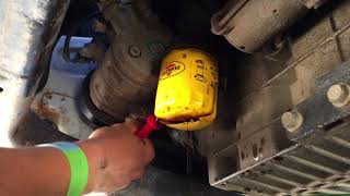 Removing A Stuck Oil Filter [upl. by Leen]