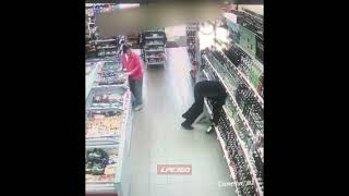 Drunk man falls in liquor shelf in store [upl. by Hama692]