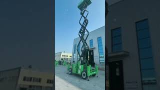 680kg heavyduty diesel offroad scissor lift truck under load test [upl. by Cutter554]