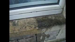 2 of 3 Facade Cleaning removing pollution staining drom a sandstone window sill [upl. by Aneetsirk]