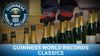 Guinness World Records Day 2013  Most Bottles Walked On [upl. by Ailemrac37]