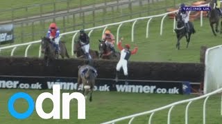 This jockey walks away from a spectacular somersaulting fall [upl. by Aivataj]