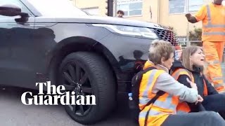 Footage shows moment Insulate Britain protester was pushed by wheels of car [upl. by Oaht687]