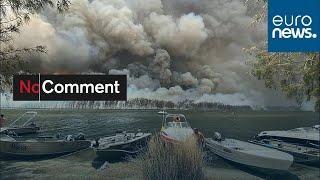 Raging wildfires and huge plumes of smoke in Lake Conjola Australia [upl. by Shultz]