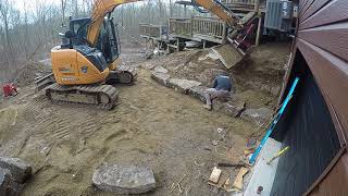 Case CX75 building stone retaining wall timelapse [upl. by Aitenev]