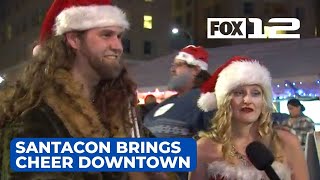 Portlanders fill downtown with Christmas cheer for SantaCon [upl. by Eleumas]