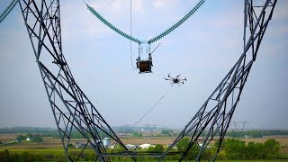 Drone Stringing Transmission Lines [upl. by Elaval]