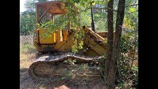 Putting Track Back On Caterpillar 941 [upl. by Naynek]