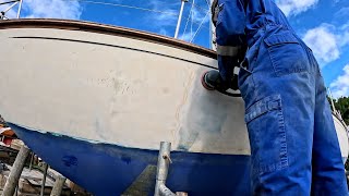 Removing years of failed paint from a 60 year old boat hull [upl. by Yeliak39]