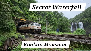 Netravati Express passing though Konkan Secret Waterfall near Ratnagiri monsoon Indian Railway [upl. by Anirad808]