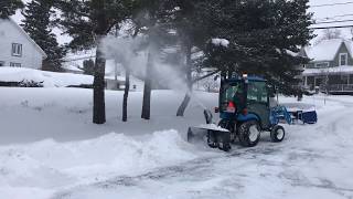 Ls Xj2025 H Snowplowing With 8 Foot Pusher And Berco Snowblower [upl. by Annaynek]