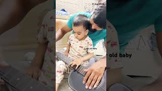 2 year old baby playing Guitar 🎸 shorts ytshorts toddleravyukt baby 2yearsold messymoments [upl. by Elsinore]