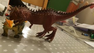 Dinosaur carnotaur attack scene toy style [upl. by Marylin]