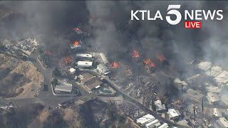 Brush Fire Engulfs Mobile Home Park Near Calimesa California [upl. by Anivas239]