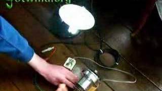 Free energy  Dynohub Powering a 12v fluorescent lamp CFL [upl. by Killigrew738]