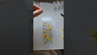 How to make pressed flower bookmark with lamintating [upl. by Chesna]