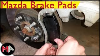 Mazda 6 Front Brake Pads Replacement [upl. by Alinoel392]