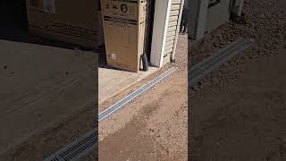 Steep sloped driveway paving with a drain install construction driveway drain [upl. by Inittirb641]