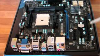 Unboxing amp Look at MSI FM2A75MAE35 Motherboard [upl. by Nnaitsirhc690]