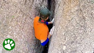 Brave man climbs down narrow ravine after hearing cries for help [upl. by Haslam]