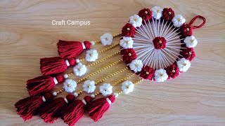 Super Easy Woolen Flower Wall Hanging Craft  Woolen Thread Craft Ideas  Woolen Wall Hanging Design [upl. by Salvador]