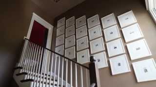 How To Hang Art in a Stairway  Southern Living [upl. by Eiramrebma]