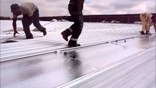 Rolling lifting amp Installing roof sheets [upl. by Akyre]