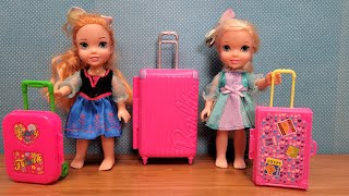 Luggage shopping  Elsa amp Anna toddlers are packing suitcase bags [upl. by Viviene]