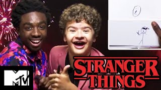 Stranger Things 3 Stars Gaten Matarazzo amp Caleb McLaughlin Play Stranger Pictionary  MTV Movies [upl. by Ase]