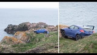 Man jumps out of car moments before it falls over ‘Dracula’ castle cliff [upl. by Namzzaj]