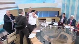 Greek politician throws water smacks female opponent [upl. by Bj]