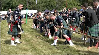 Tug o War competition with Ballater Pipe Band v audience during 2023 Tomintoul Highland Games [upl. by Barcellona914]