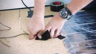 Installing electric floor heating under laminate flooring [upl. by Aikemat874]